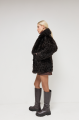 Double-sided curly sheepskin coat in dark chocolate color made of natural sheepskin in OVERSIZE style